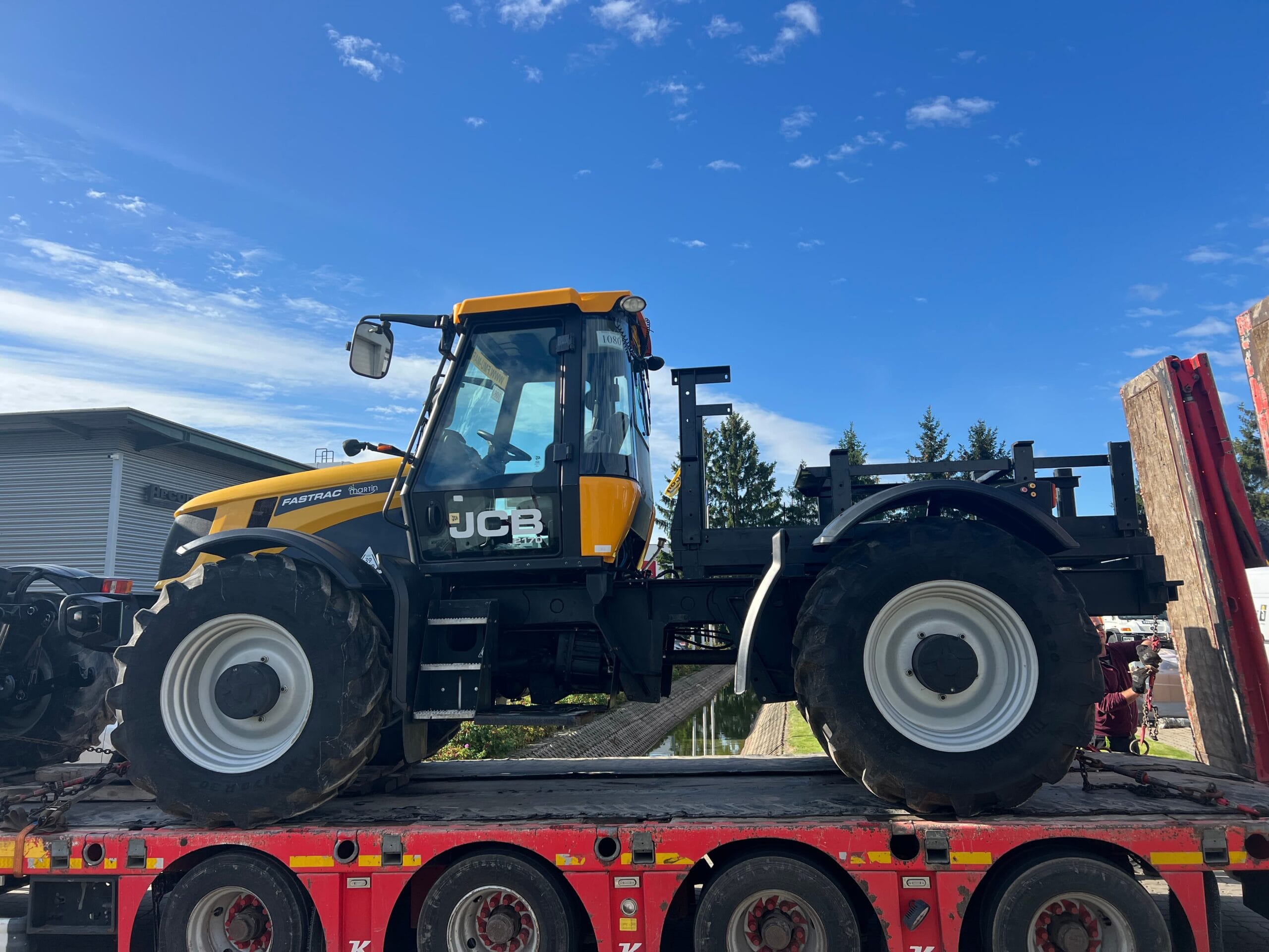 Electric JCB Fastrac agricultural tractor for passenger transport in the mountains – specialist vehicle conversion